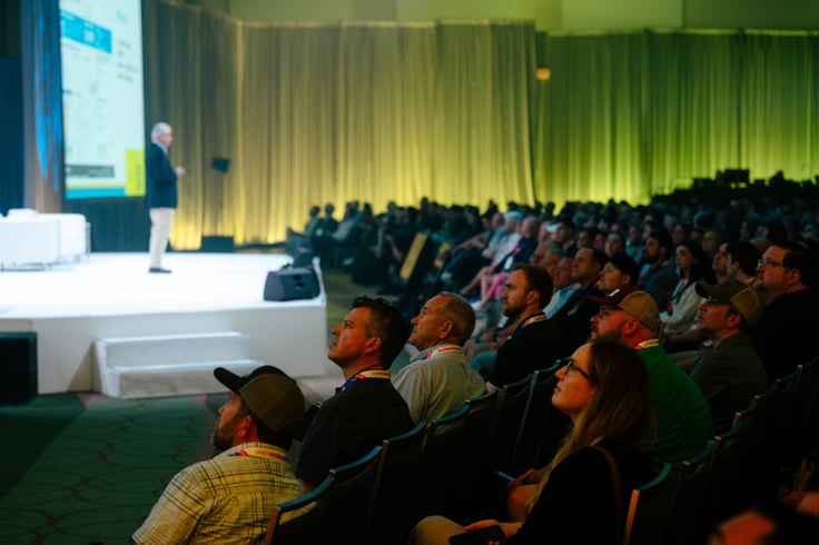 audience and presenter on stage