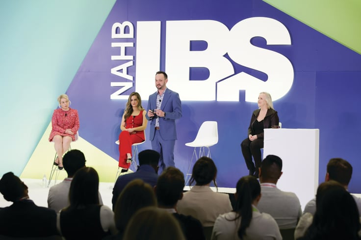 Four presenters on stage