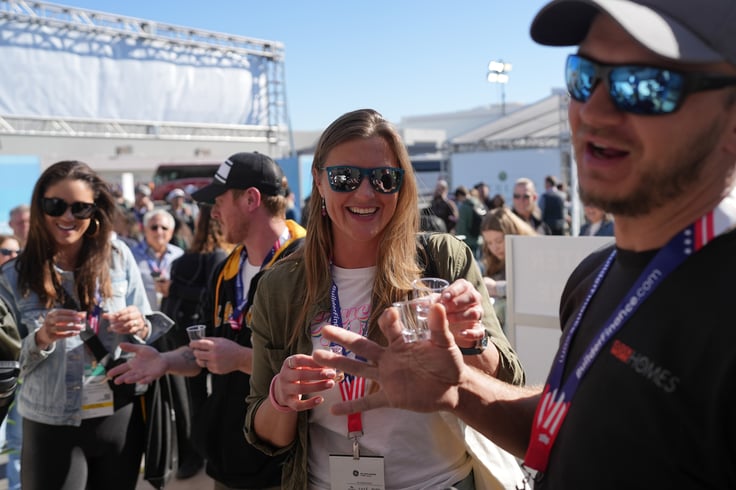 Three building professionals attend an official Show Village Happy Hour