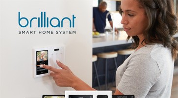 Woman touching smart home wall panel