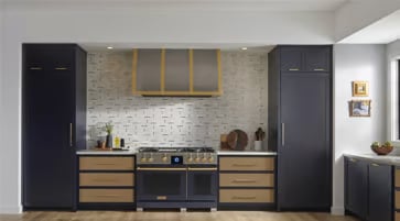 Kitchen with dual range stove, refrigerator